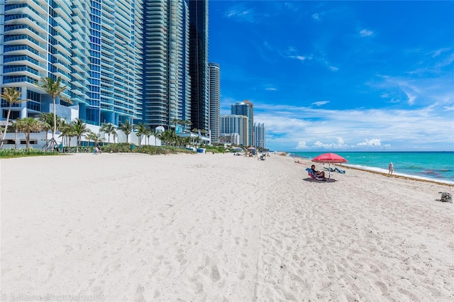 property view of water featuring a beach view