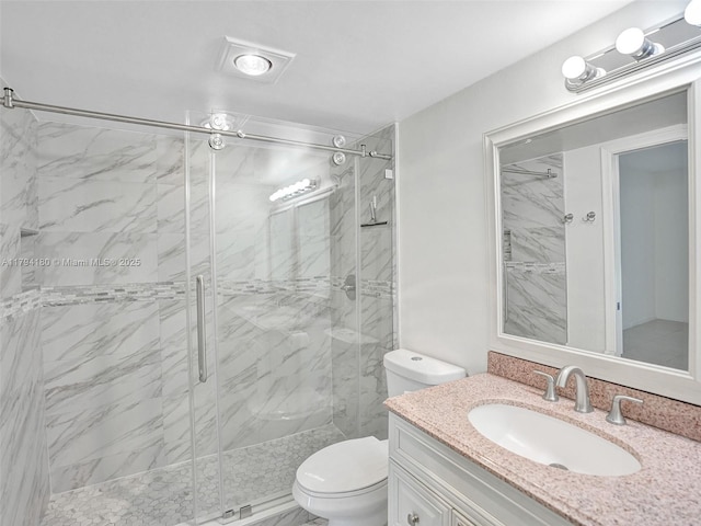 3501 Bimini Ln Unit K2, Coconut Creek, FL 33066 - bathroom with vanity, toilet, and a marble finish shower