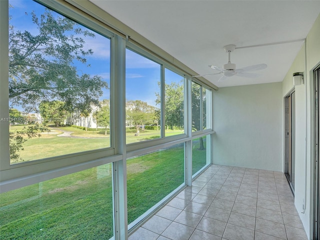 3501 Bimini Ln Unit K2, Coconut Creek, FL 33066 - unfurnished sunroom with a ceiling fan and tile patterned flooring