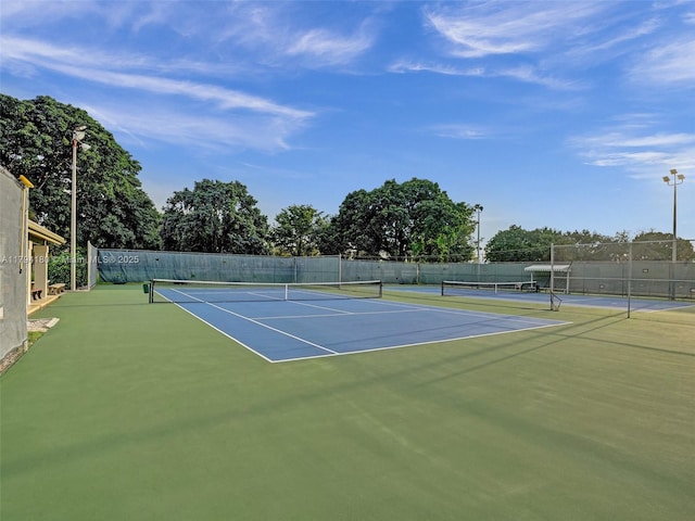 3501 Bimini Ln Unit K2, Coconut Creek, FL 33066 - view of sport court featuring fence and community basketball court