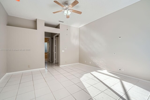 1081 SW 156th Ave, Pembroke Pines, FL 33027 - empty room with a ceiling fan, light tile patterned flooring, and baseboards