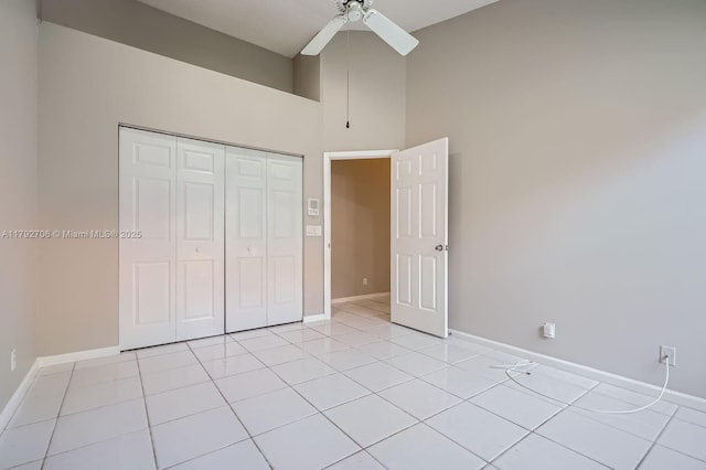 1081 SW 156th Ave, Pembroke Pines, FL 33027 - unfurnished bedroom with a high ceiling, baseboards, a closet, light tile patterned floors, and ceiling fan