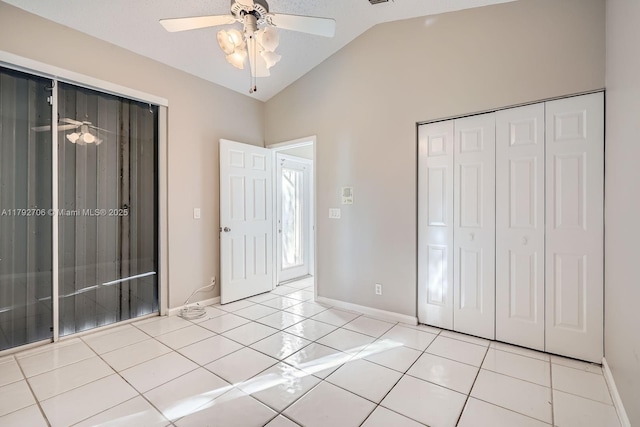 1081 SW 156th Ave, Pembroke Pines, FL 33027 - unfurnished bedroom featuring vaulted ceiling, baseboards, a closet, ceiling fan, and light tile patterned floors