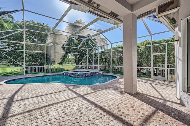 1081 SW 156th Ave, Pembroke Pines, FL 33027 - view of pool featuring a pool with connected hot tub, a patio, and a fenced backyard