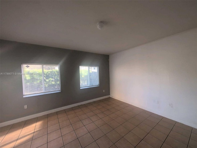 view of tiled spare room