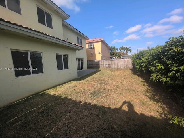 view of yard with fence