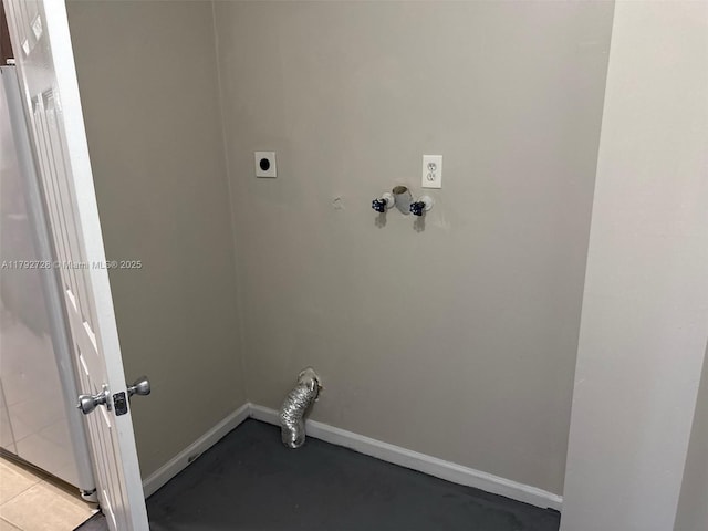 laundry area with baseboards, hookup for an electric dryer, and laundry area