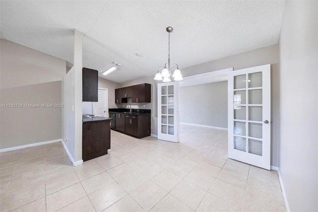 1251 SW 73rd Ave, North Lauderdale, FL 33068 - kitchen featuring french doors, a sink, dark countertops, dark brown cabinets, and a chandelier