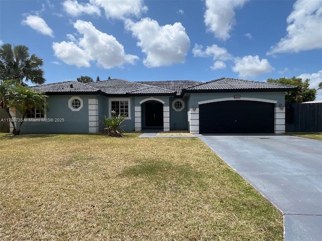 ranch-style home featuring an attached garage, a front lawn, stucco siding, and concrete driveway
