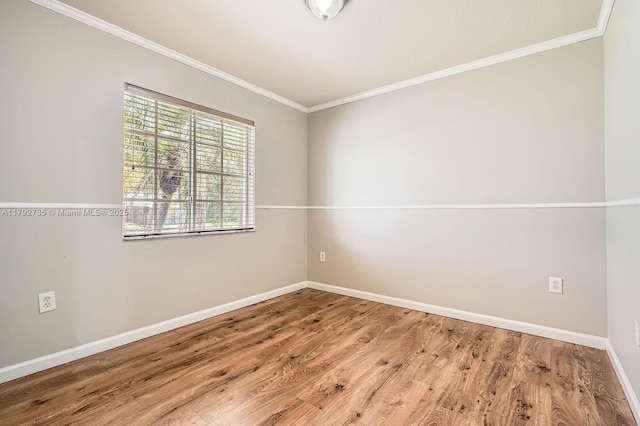 12846 SW 211th Ter, Miami, FL 33177 - spare room featuring baseboards, ornamental molding, and wood finished floors