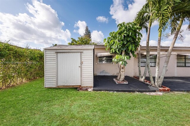9103 NW 81st Ct, Tamarac, FL 33321 - view of outbuilding with an outdoor structure