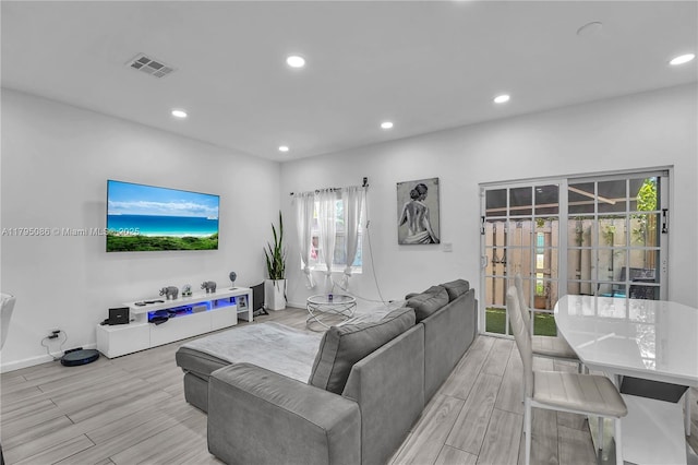 2307 Washington St Unit 5, Hollywood, FL 33020 - living room with light wood-style floors and recessed lighting