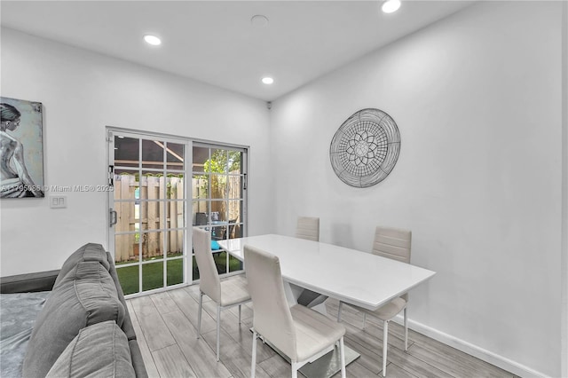 2307 Washington St Unit 5, Hollywood, FL 33020 - dining room with light wood-style flooring and recessed lighting