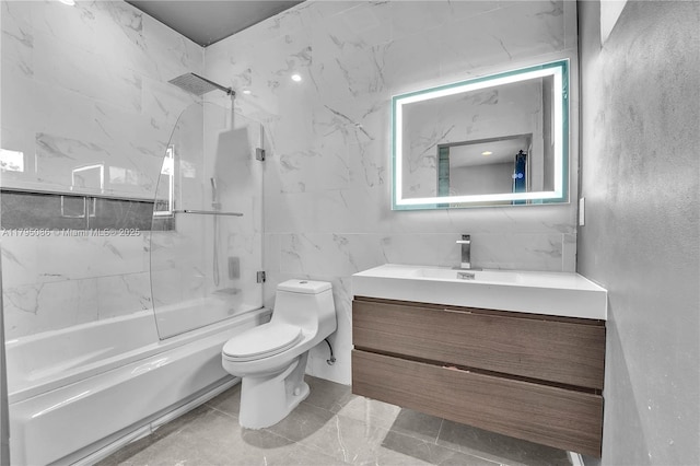 2307 Washington St Unit 5, Hollywood, FL 33020 - full bathroom with enclosed tub / shower combo, vanity, and tile walls