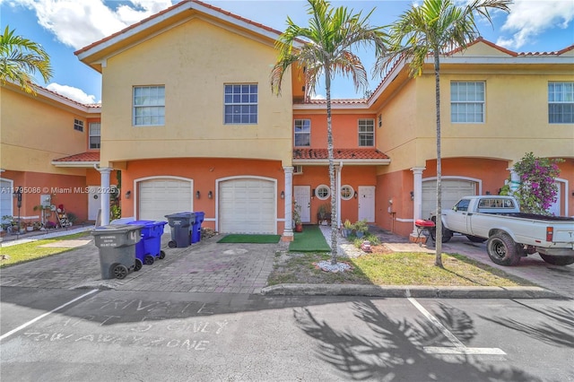 2307 Washington St Unit 5, Hollywood, FL 33020 - multi unit property with a tile roof, driveway, and stucco siding