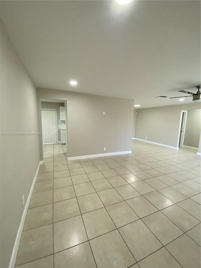 5009 NW 51st Ct, Tamarac, FL 33319 - spare room with baseboards, recessed lighting, ceiling fan, and light tile patterned floors