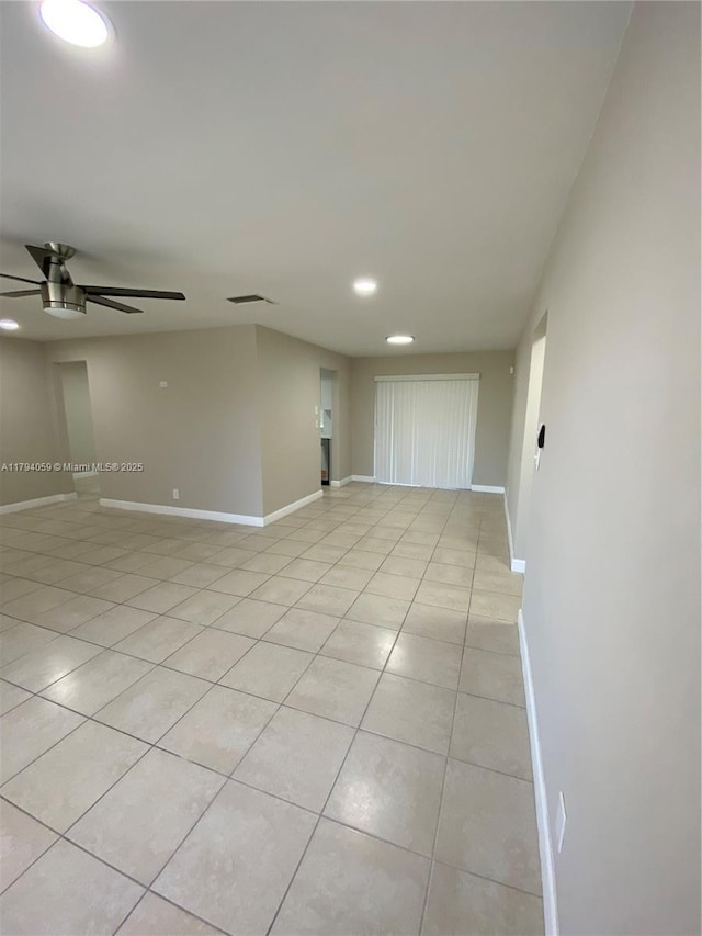 5009 NW 51st Ct, Tamarac, FL 33319 - empty room featuring light tile patterned floors, baseboards, a ceiling fan, and recessed lighting