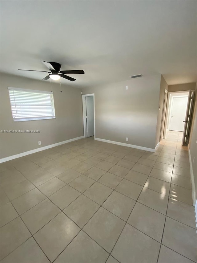 5009 NW 51st Ct, Tamarac, FL 33319 - unfurnished room with baseboards, a ceiling fan, light tile patterned flooring, and visible vents