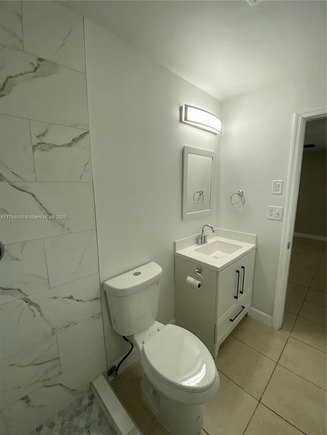 5009 NW 51st Ct, Tamarac, FL 33319 - bathroom with vanity, marble finish floor, a shower, toilet, and baseboards