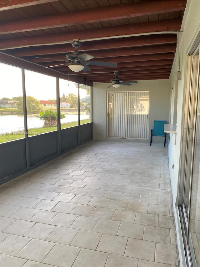 5009 NW 51st Ct, Tamarac, FL 33319 - unfurnished sunroom featuring a ceiling fan and beam ceiling