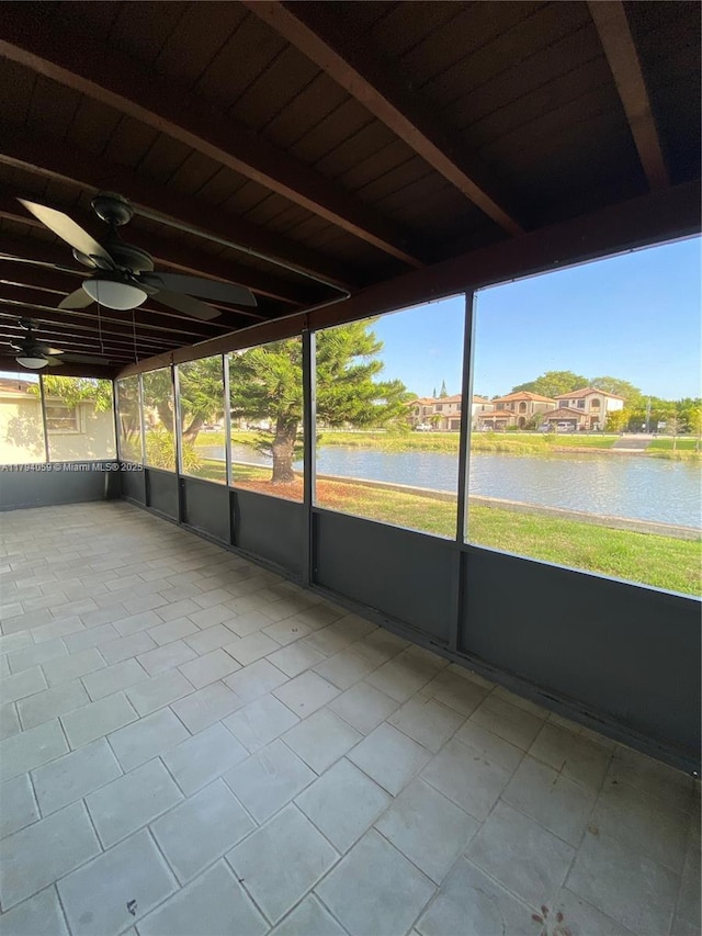 5009 NW 51st Ct, Tamarac, FL 33319 - unfurnished sunroom featuring a ceiling fan and a water view