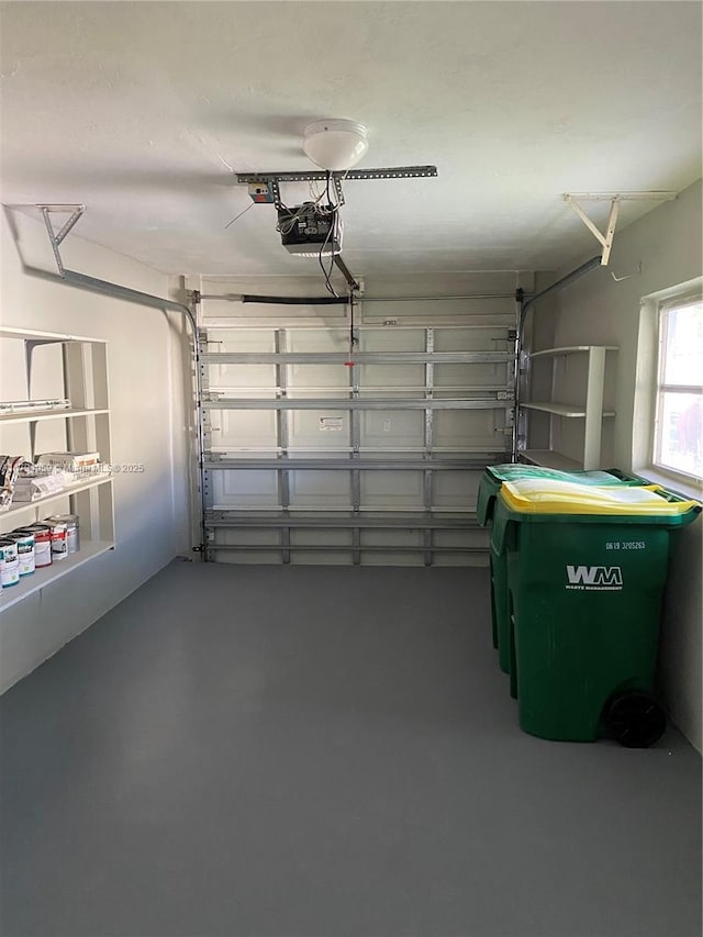 5009 NW 51st Ct, Tamarac, FL 33319 - garage featuring a garage door opener