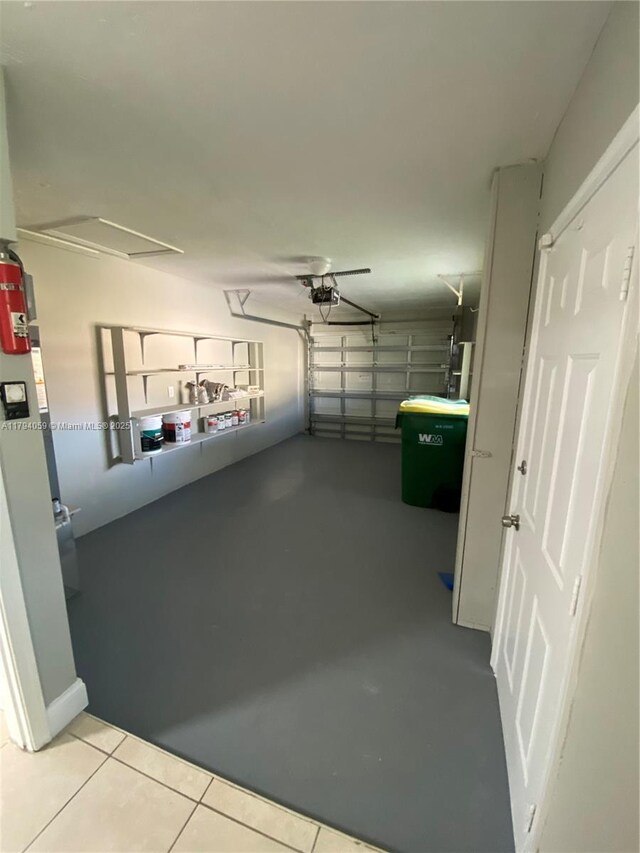 5009 NW 51st Ct, Tamarac, FL 33319 - garage with a garage door opener