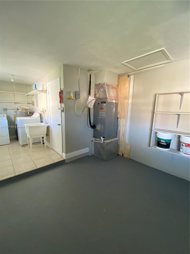 5009 NW 51st Ct, Tamarac, FL 33319 - utility room featuring washing machine and clothes dryer and heating unit