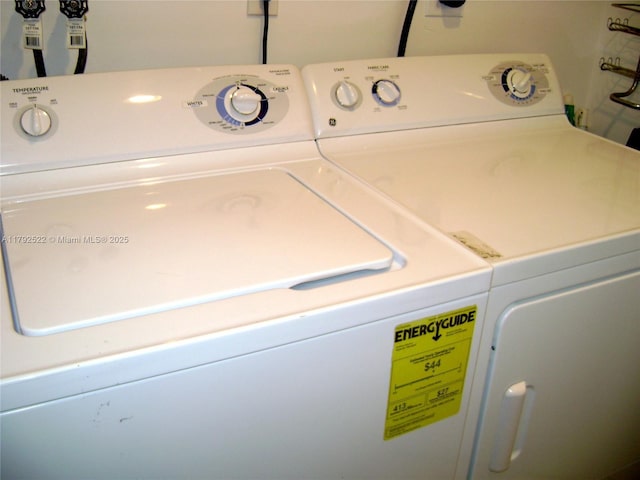 laundry room with washer and dryer