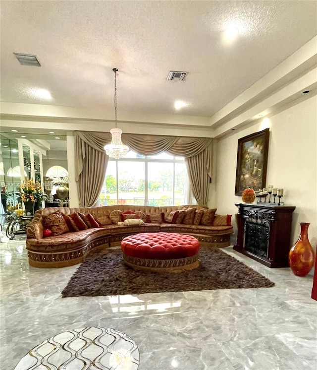 12022 Classic Dr, Coral Springs, FL 33071 - living area with marble tiled floors, a fireplace, a textured ceiling, and a chandelier