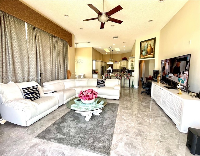 12022 Classic Dr, Coral Springs, FL 33071 - living room with a ceiling fan, light marble finish flooring, recessed lighting, and a textured ceiling