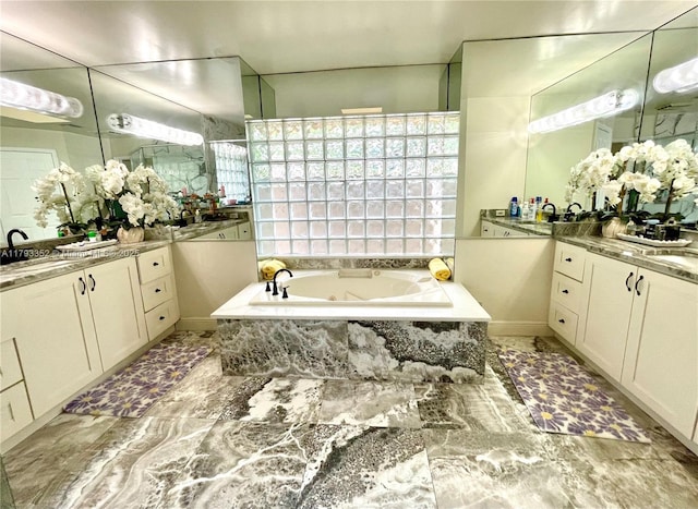 12022 Classic Dr, Coral Springs, FL 33071 - full bathroom with a garden tub, baseboards, and two vanities