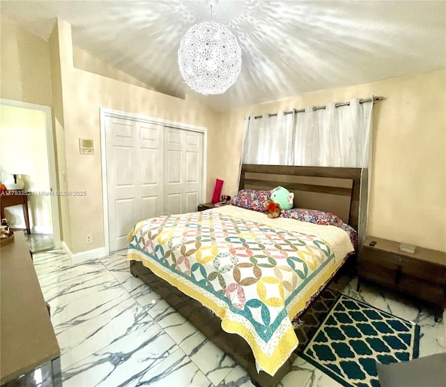 12022 Classic Dr, Coral Springs, FL 33071 - bedroom featuring a closet, marble finish flooring, and a chandelier