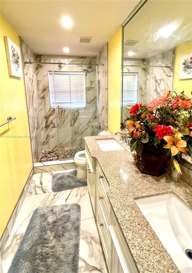 12022 Classic Dr, Coral Springs, FL 33071 - full bathroom featuring marble finish flooring, toilet, a marble finish shower, and double vanity