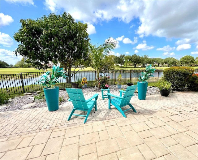 12022 Classic Dr, Coral Springs, FL 33071 - view of patio with fence and a water view