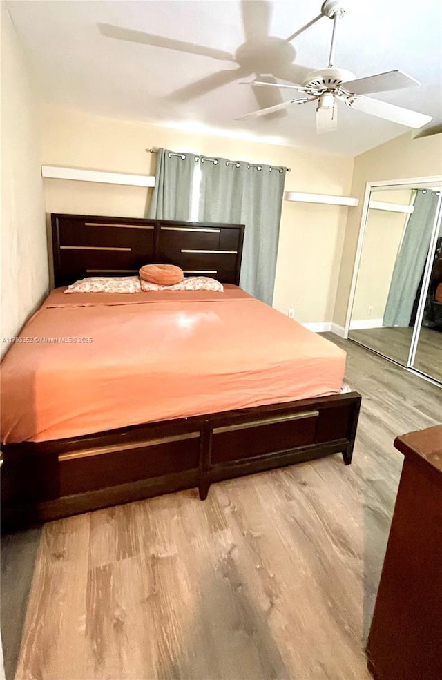 12022 Classic Dr, Coral Springs, FL 33071 - bedroom featuring wood finished floors and ceiling fan