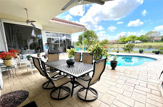 12022 Classic Dr, Coral Springs, FL 33071 - view of patio / terrace with fence, a ceiling fan, and a water view