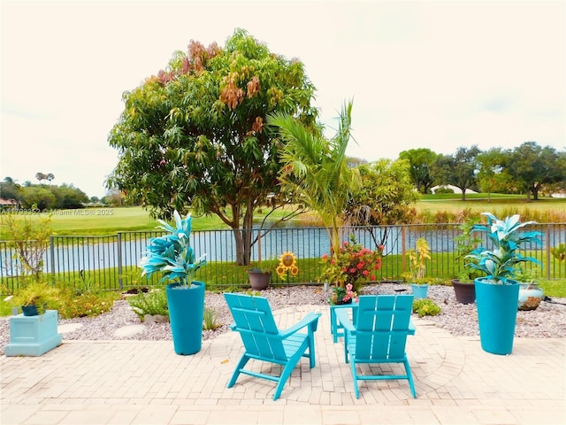 12022 Classic Dr, Coral Springs, FL 33071 - fenced backyard with a patio area and a water view