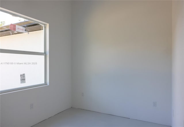 unfurnished room with a wealth of natural light