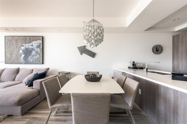 dining space featuring a chandelier