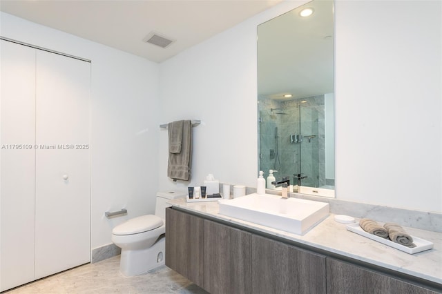 full bath with visible vents, vanity, toilet, recessed lighting, and a shower stall