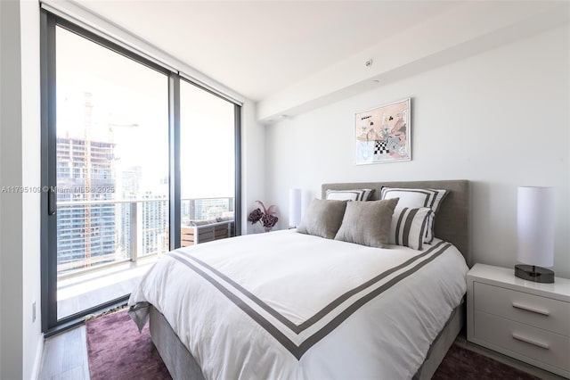 bedroom with a city view