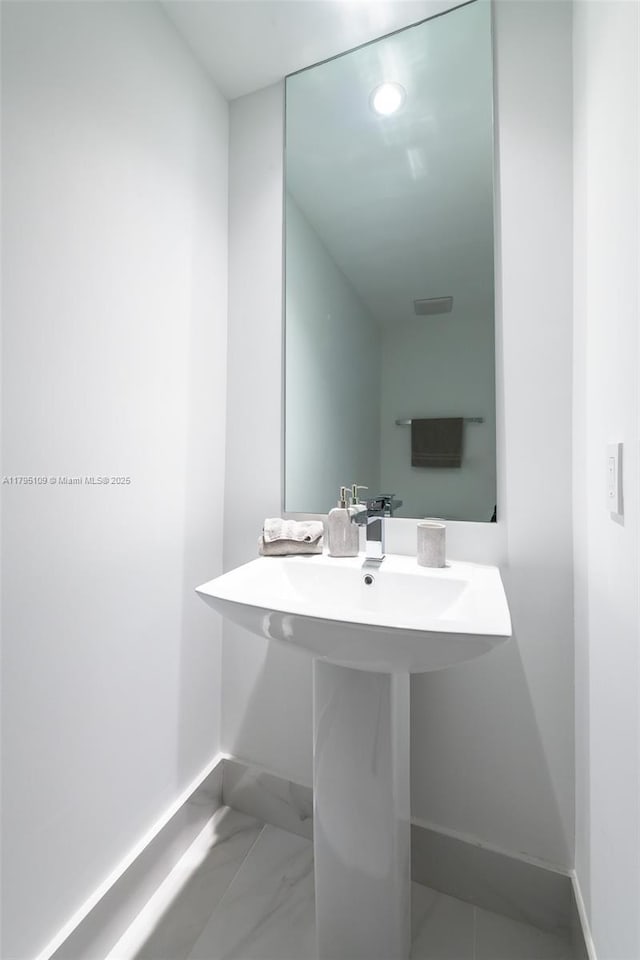 bathroom with baseboards