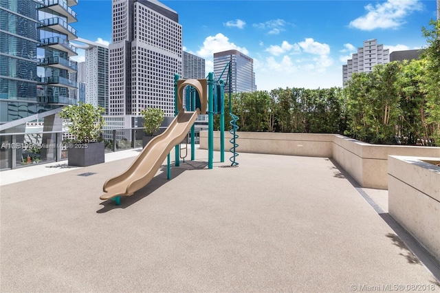 communal playground with a city view