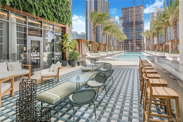 community pool with a city view