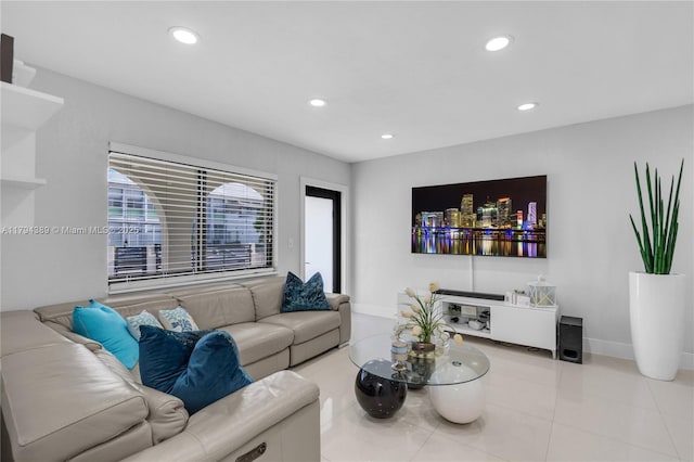 617 W 33rd St, Hialeah, FL 33012 - tiled living room with recessed lighting and baseboards