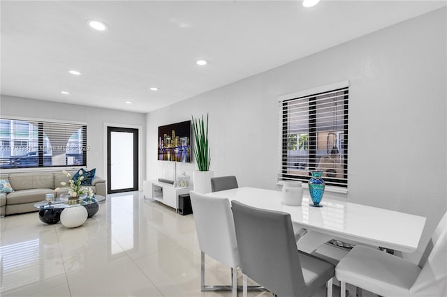 617 W 33rd St, Hialeah, FL 33012 - dining area with recessed lighting and light tile patterned flooring