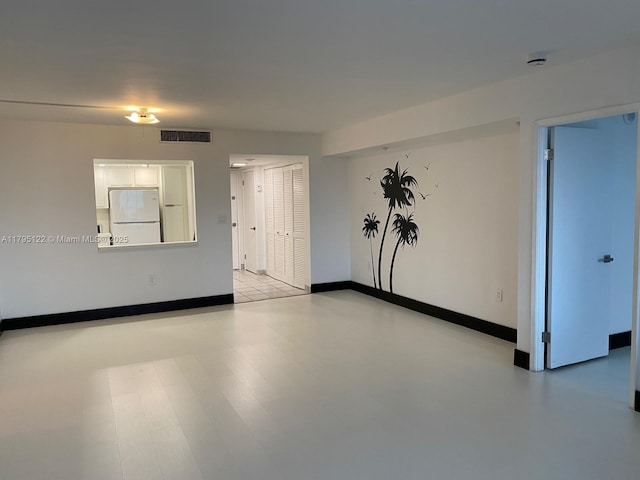 20515 E Country Club Dr Unit 649, Aventura, FL 33180 - unfurnished room with baseboards and visible vents