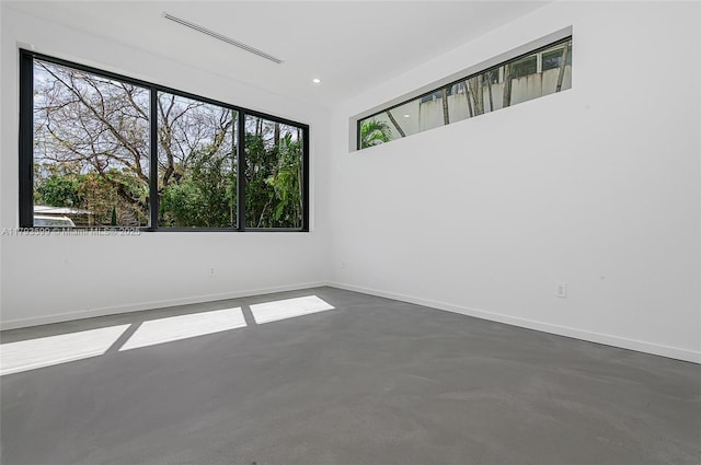 2730 SW 17th Ave, Miami, FL 33133 - unfurnished room featuring baseboards, recessed lighting, and concrete floors