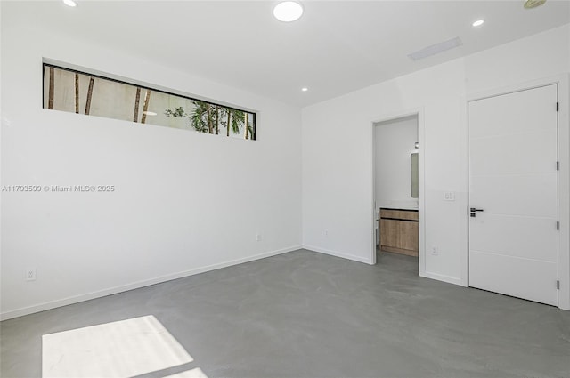 2730 SW 17th Ave, Miami, FL 33133 - unfurnished bedroom with ensuite bath, visible vents, concrete flooring, baseboards, and recessed lighting